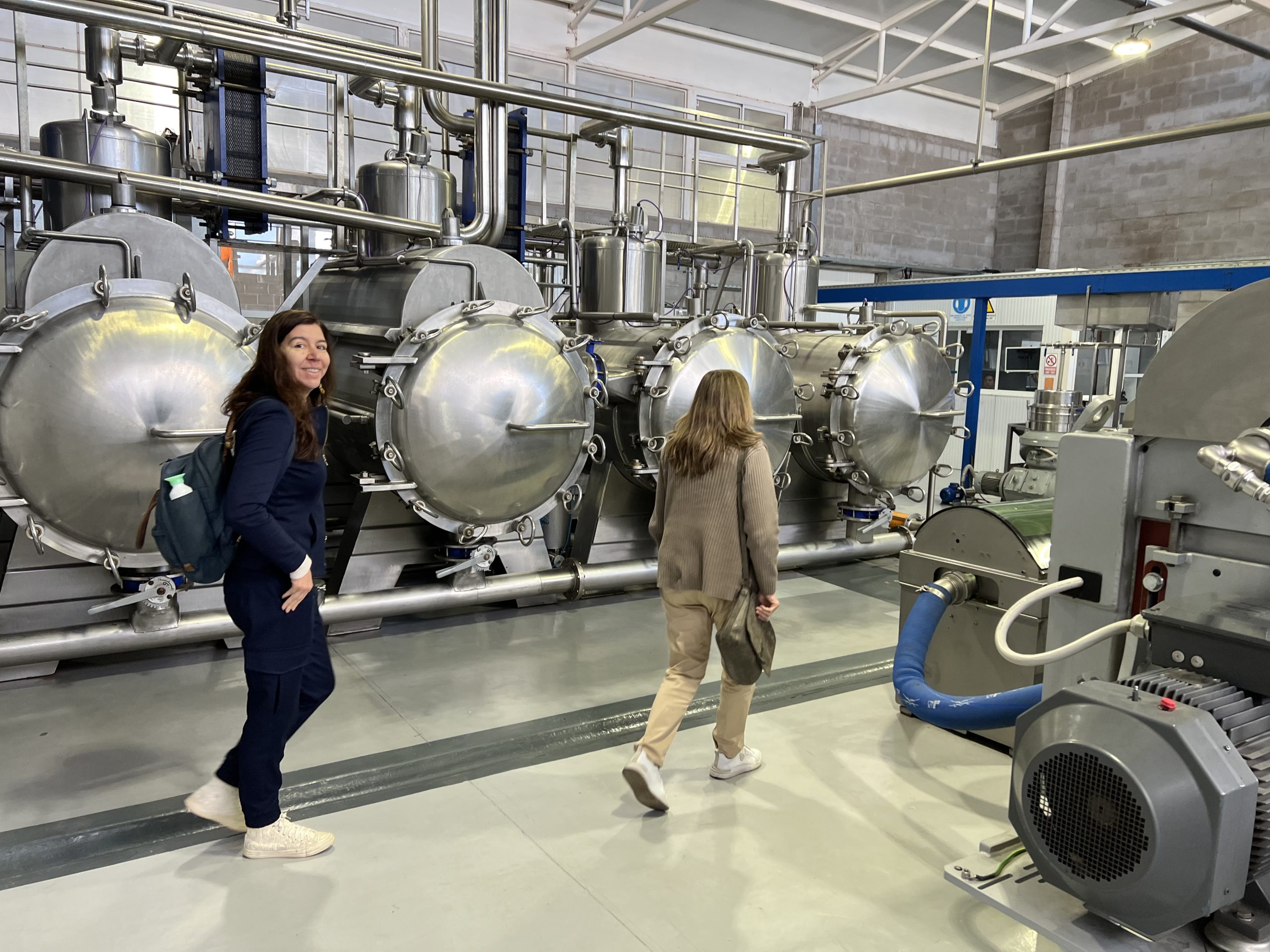 Marisa visiting a working olive mill
